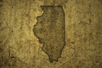 Obraz na płótnie Canvas map of illinois state on a old vintage crack paper background .
