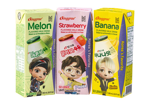 Three Cartons of Binggrae Milk Isolated on White Background.
