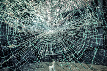 Close-up broken car windshield. Broken and damaged car