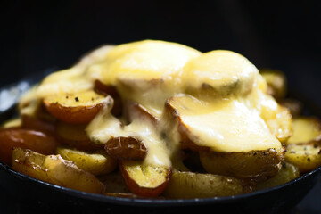 French raclette baked potatoes