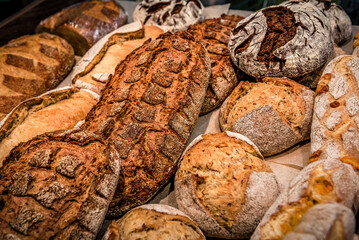 Different kinds of fresh bread as background