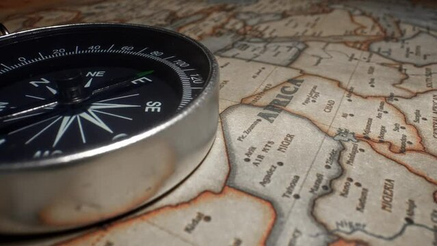 Compass on the map of Africa. Travel concept.