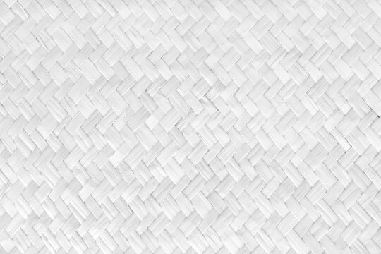 Pattern of white reed weaving mat with vintage style for background and design art work.