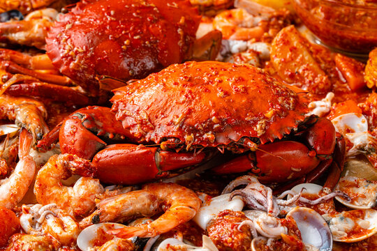 Crab sauce padang (Indonesian Kepiting Saus Padang). dish of crab served in hot and spicy Padang sauce.