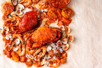 Crab sauce padang (Indonesian Kepiting Saus Padang). dish of crab served in hot and spicy Padang sauce.