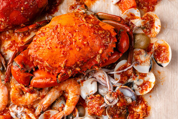 Crab sauce padang (Indonesian Kepiting Saus Padang). dish of crab served in hot and spicy Padang sauce.