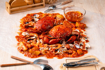 Crab sauce padang (Indonesian Kepiting Saus Padang). dish of crab served in hot and spicy Padang sauce.