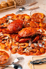 Crab sauce padang (Indonesian Kepiting Saus Padang). dish of crab served in hot and spicy Padang sauce.