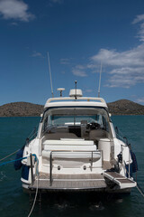 Fototapeta premium Elounda, Crete, Greece, EU. 2023. Motor yacht on the Mirabella Gulf at Elounda, Crete