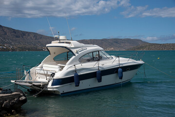 Elounda, Crete, Greece, EU. 2023. Motor yacht on the Mirabella Gulf at Elounda, Crete