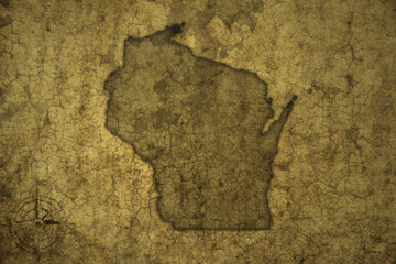 map of wisconsin state on a old vintage crack paper background .