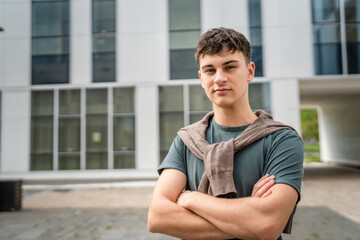 portrait of young Caucasian man teenager 18 or 19 years old outdoor