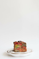 Close up a slice colorful mixed fruit cake