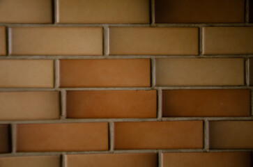 Custom wall with tiles imitating bricks