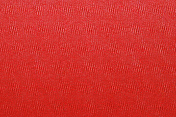 Red color glossy craft paper texture as background
