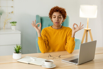 No stress keep calm. Mindful african businesswoman practices breathing exercises at home office....