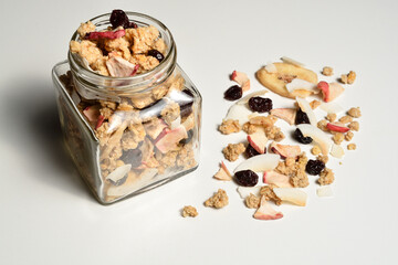 Delicious breakfast muesli with dried coconut, banana, apple, cranberries and raisins.