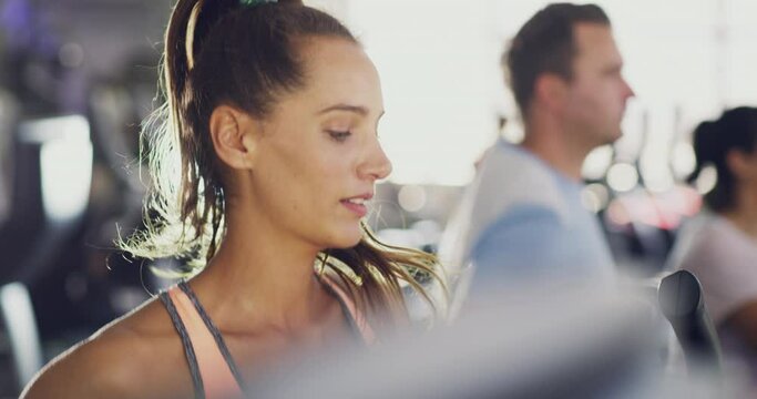 Fitness, running and treadmill with woman at gym for exercise, workout and endurance goal. Cardio, stamina and health with people training in sports center for challenge, energy and performance