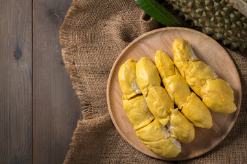 Top view Chani Kai Durian or Durio zibthinus murray on wood plate. KIng of fruits of thailand