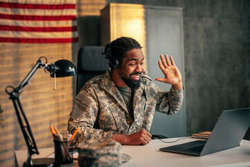 American soldier video call with family.