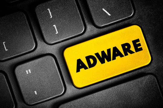 Adware - unwanted software designed to throw advertisements up on your screen, text concept button on keyboard