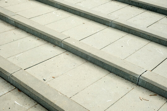Grey tiles for the steps, with a bardur stone. and a place for the inscription.