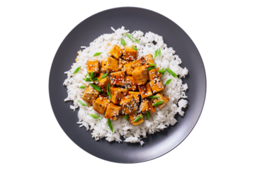 plate of rice and fried tofu with sesame seeds isolated on transparent background, top view