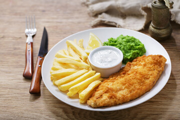 plate of fish and chips with french fries