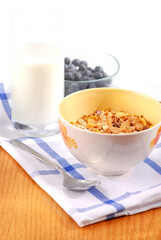 Healthy breaksfast of cereal, milk and blueberries