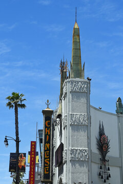 HOLLYWOOD, CALIFORNIA - 12 MAY 2023: Chinese sign on the The TCL Chinese Theatre on Hollywood Boulevard, with the Madame Tussauds in the background.