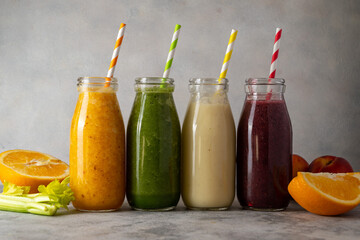 Fresh fruit smoothie bottles, healthy detox drinks.