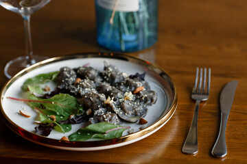 Mushroom beef stroganoff, with cremini and champignons, in a frying pan