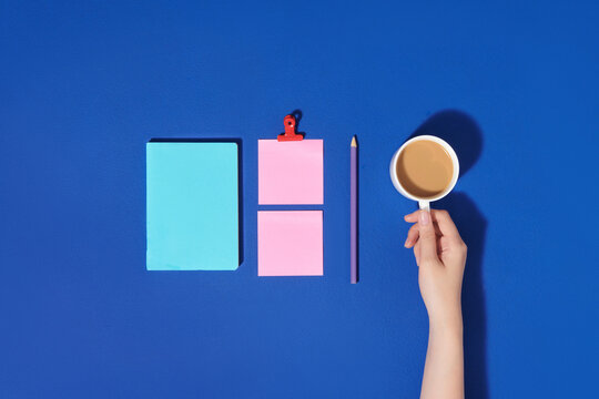 Modern office desk table with notepaper and other supplies