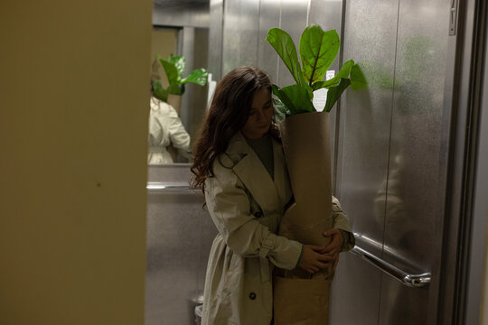 girl getting off the elevator