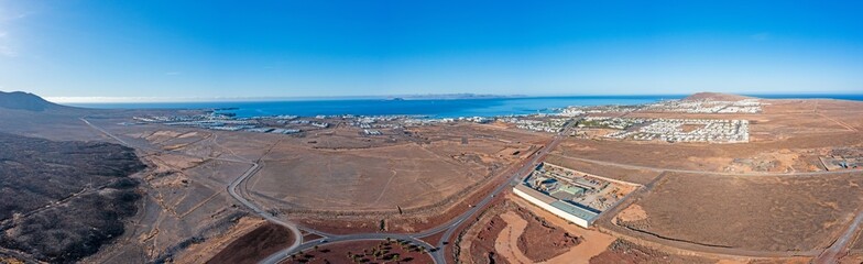 Drone panorama picture over Playa Blanca vacation village in Lanzarote