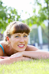 Portrait of young beautiful woman  in summer environment