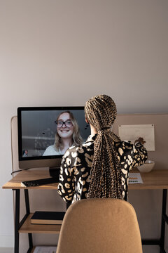Freelancer checking schedule during online consultation