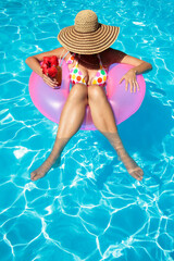 Women with Hat in Pool