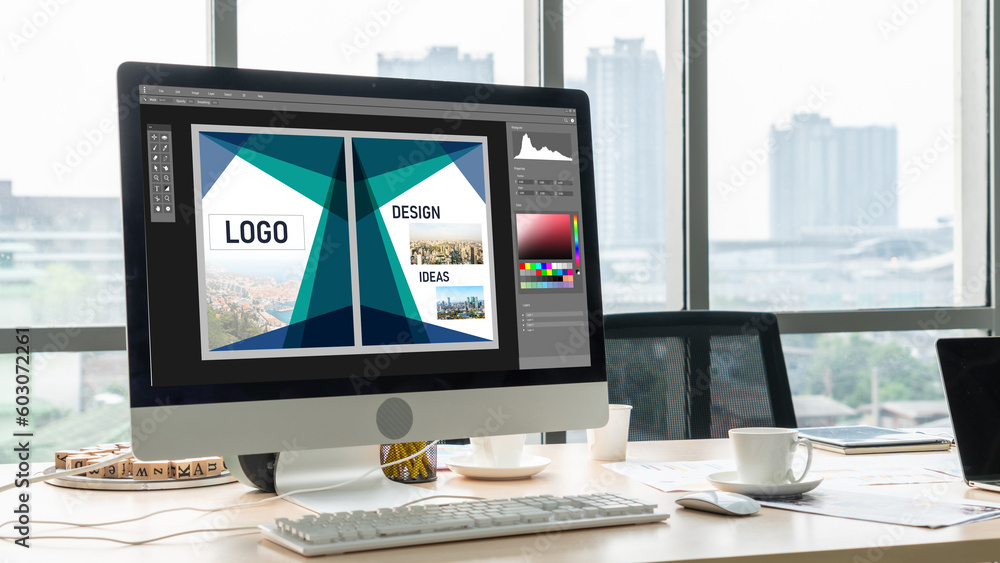 Wall mural graphic designer software for modern design of web page and commercial ads showing on the computer s