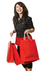 A very happy shopping girl holding bags and smiling wildly about her rabid consumerism.