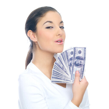Portrait of a nice looking woman holding bunch of banknotes
