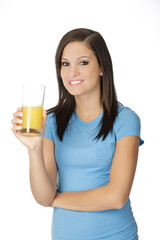 Beautiful Caucasian woman holding a glass of orange juice