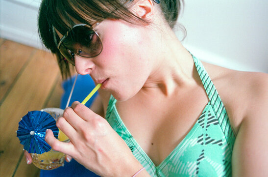 Woman enjoying a cocktail 