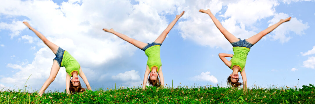 Composite image of young teenage girl doing cartwheel in a summer meadow
