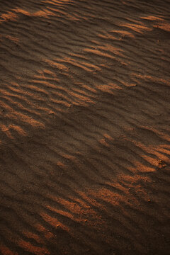 Sand patters at the beach at sunset