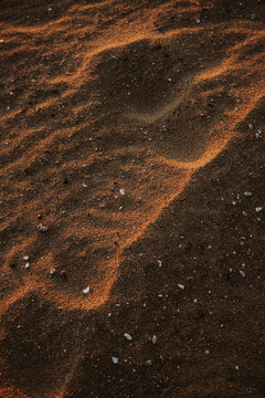 Sand patters at the beach at sunset