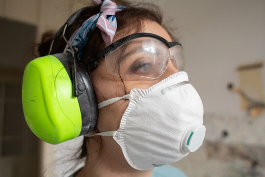 Portrait of a woman wearing safety gear