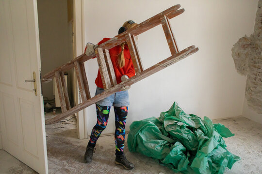 A woman is renovating her home