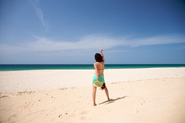 Fototapeta na wymiar woman at beach of palmar in cadiz spain