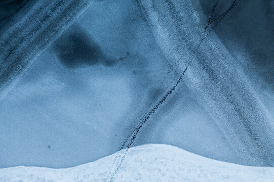 2d top shot frozen ice pattern on lake winter 